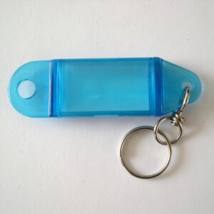 TARGHETTA PORTANOME TRASPARENTE CON ANELLO